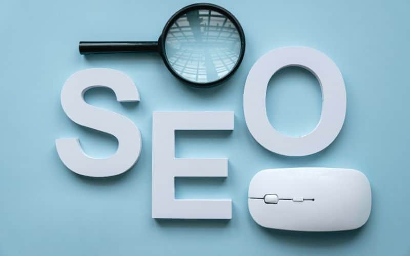 SEO Grafik mit Lupe und Maus